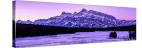 Scenic view of frozen Two Jack Lake at dawn, Mount Rundle, Banff National Park, Alberta, Canada-null-Stretched Canvas