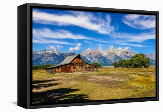 Scenic View of Grand Teton with Old Wooden Farm-MartinM303-Framed Stretched Canvas