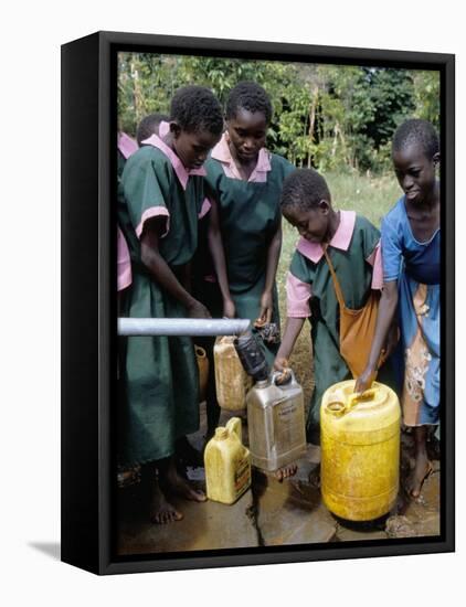 School Children at Water Pump, Kenya, East Africa, Africa-Liba Taylor-Framed Stretched Canvas