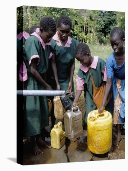 School Children at Water Pump, Kenya, East Africa, Africa-Liba Taylor-Stretched Canvas