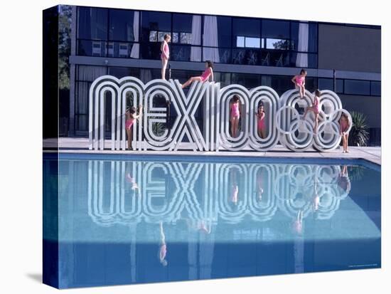 School Children Playing on Olympic Logo "Mexico 68" Beside Pool-John Dominis-Stretched Canvas
