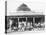 School Children Waiting for the Bus at the General Store-Ralph Crane-Stretched Canvas