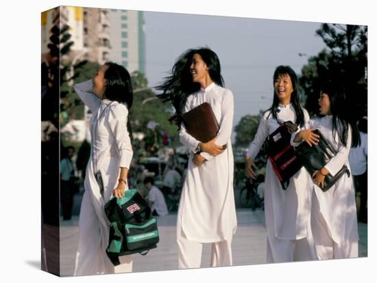 School Girls Facing Ho Chi Minh Statue, Ho Chi Minh City (Saigon), Vietnam, Indochina-Alain Evrard-Stretched Canvas