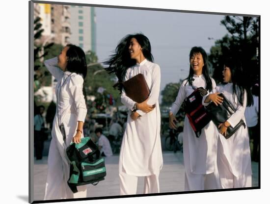 School Girls Facing Ho Chi Minh Statue, Ho Chi Minh City (Saigon), Vietnam, Indochina-Alain Evrard-Mounted Photographic Print