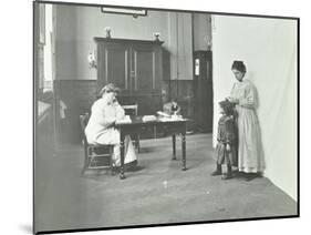 School Nurse Examining Girls Hair for Head Lice, Chaucer School, London, 1911-null-Mounted Photographic Print