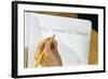 Schoolboy Writing Name in Notebook-William P. Gottlieb-Framed Photographic Print