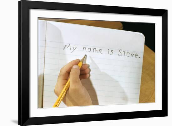 Schoolboy Writing Name in Notebook-William P. Gottlieb-Framed Photographic Print