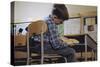 Schoolchild Placing Books in Desk-William P. Gottlieb-Stretched Canvas