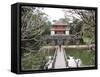 Schoolgirl Walking Through Temple Garden, Vietnam, Indochina, Southeast Asia, Asia-Purcell-Holmes-Framed Stretched Canvas