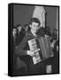 Science Student Playing the Accordian-Ed Clark-Framed Stretched Canvas