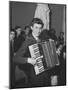 Science Student Playing the Accordian-Ed Clark-Mounted Photographic Print