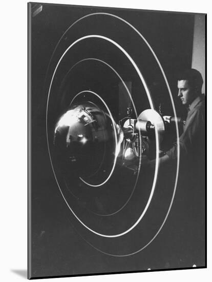 Scientist Alexander Simkovich Working on a Us Artificial Satellite-null-Mounted Photographic Print