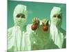 Scientists Holding GM Tomatoes-Cristina-Mounted Photographic Print