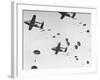 Scores of Paratroopers Dropping from C-82 "Flying Boxcar" and Landing on Level Ground-Frank Scherschel-Framed Photographic Print