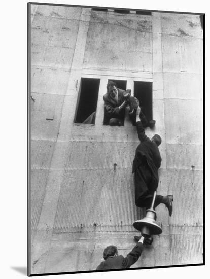 Scottish Fans Scaling Wall to Avoid High Ticket Prices For Soccer Game Between Scotland and England-Cornell Capa-Mounted Photographic Print