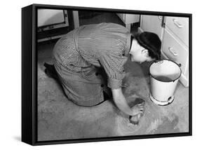 Scrubbing Kitchen Floor-null-Framed Stretched Canvas