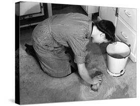 Scrubbing Kitchen Floor-null-Stretched Canvas