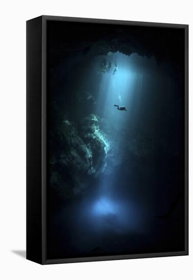 Scuba Diver Descends into the Pit Cenote in Mexico-null-Framed Stretched Canvas