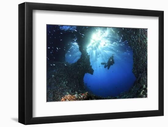 Scuba Diver Swimming through an Arch-Bernard Radvaner-Framed Photographic Print