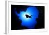 Scuba Diver Swims over Underwater Cave, Silhouette against Sun-Rich Carey-Framed Photographic Print