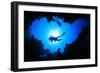 Scuba Divers Descend into an Underwater Cavern. Silhouettes against Sunburst-Rich Carey-Framed Photographic Print