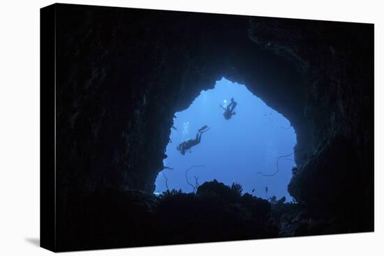Scuba Divers Explore a Cave Near the Island of Sulawesi, Indonesia-Stocktrek Images-Stretched Canvas