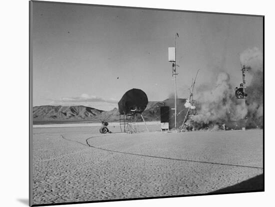 Sculpture Jean Tinguely in Nevada Desert Trying Out His Self-Destruction Machine Sculpture-Allan Grant-Mounted Photographic Print