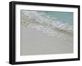 Sea, beach and sand, gentle waves picking up sand particles, Galapagos Islands-Jean Hosking-Framed Photographic Print