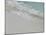 Sea, beach and sand, gentle waves picking up sand particles, Galapagos Islands-Jean Hosking-Mounted Photographic Print