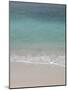 Sea, beach and sand, gentle waves picking up sand particles, Galapagos Islands-Jean Hosking-Mounted Photographic Print