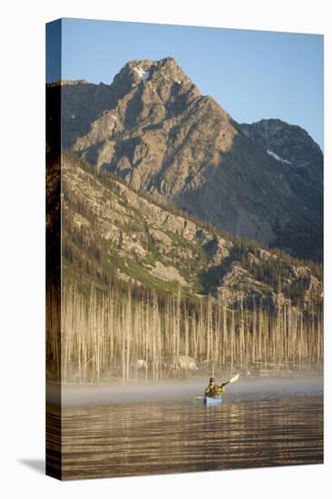 Sea Kayaking Jackson Lake In Grand Teton National Park, WY-Justin Bailie-Stretched Canvas