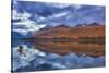 Sea kayaking on Bowman Lake in autumn in Glacier National Park, Montana, USA-Chuck Haney-Stretched Canvas