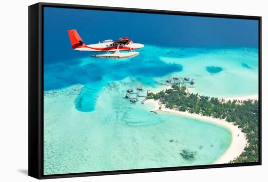 Sea Plane Flying above Maldives Islands-Jag_cz-Framed Stretched Canvas