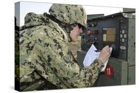 Seabee Completes a Generator Check During a Command Post Exercise-null-Stretched Canvas