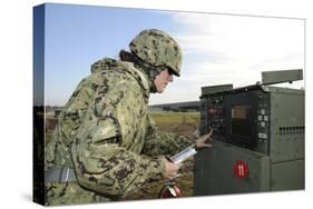 Seabee Completes a Generator Check During a Command Post Exercise-null-Stretched Canvas