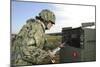 Seabee Completes a Generator Check During a Command Post Exercise-null-Mounted Photographic Print