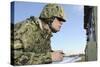 Seabee Completes a Generator Check During a Command Post Exercise-null-Stretched Canvas