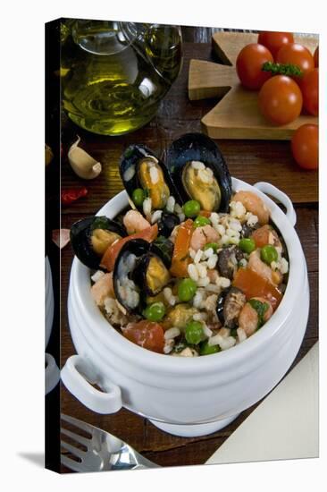 Seafood Rice with Mussels, Shrimps, Tomato, Olives, Peas, Italian Cuisine, Italy-Nico Tondini-Stretched Canvas