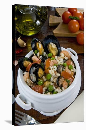 Seafood Rice with Mussels, Shrimps, Tomato, Olives, Peas, Italian Cuisine, Italy-Nico Tondini-Stretched Canvas