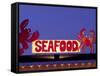 Seafood Sign at Night, Cape Breton, Nova Scotia, Canada-Walter Bibikow-Framed Stretched Canvas