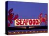 Seafood Sign at Night, Cape Breton, Nova Scotia, Canada-Walter Bibikow-Stretched Canvas