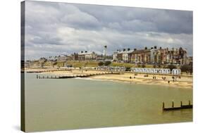 Seafront of Attractive Town with Lighthouse, Beach Huts, Southwold, Suffolk, England, UK-Rob Francis-Stretched Canvas