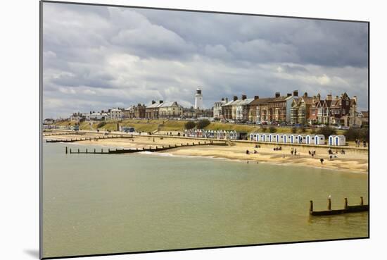 Seafront of Attractive Town with Lighthouse, Beach Huts, Southwold, Suffolk, England, UK-Rob Francis-Mounted Photographic Print
