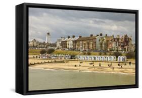 Seafront of Attractive Town with Lighthouse, Beach Huts, Southwold, Suffolk, England, UK-Rob Francis-Framed Stretched Canvas