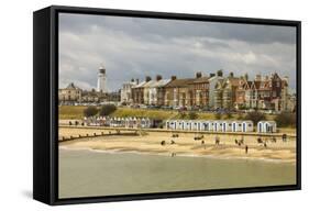 Seafront of Attractive Town with Lighthouse, Beach Huts, Southwold, Suffolk, England, UK-Rob Francis-Framed Stretched Canvas