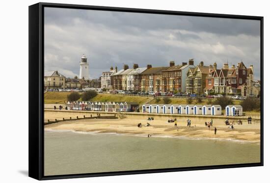 Seafront of Attractive Town with Lighthouse, Beach Huts, Southwold, Suffolk, England, UK-Rob Francis-Framed Stretched Canvas