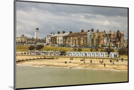 Seafront of Attractive Town with Lighthouse, Beach Huts, Southwold, Suffolk, England, UK-Rob Francis-Mounted Photographic Print