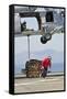 Seaman Hooks a Pallet to an Mh-60S Sea Hawk Helicopter-null-Framed Stretched Canvas