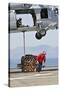 Seaman Hooks a Pallet to an Mh-60S Sea Hawk Helicopter-null-Stretched Canvas