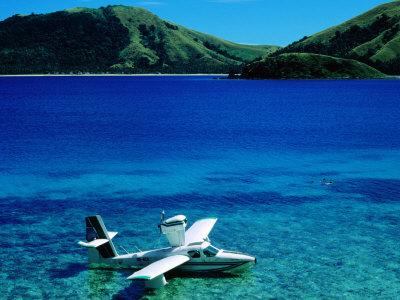 https://imgc.allpostersimages.com/img/posters/seaplane-in-water-between-yasawa-and-sawa-i-lau-islands-fiji_u-L-P3RWNV0.jpg?artPerspective=n
